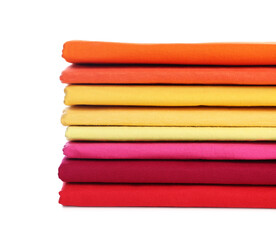 Stack of clean colorful t-shirts isolated on white