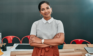 Woman, architect and portrait in office with arms crossed, pride or smile in career at construction...