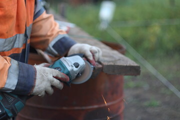 person working on a saw
