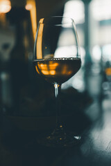 A glass of white wine on the table