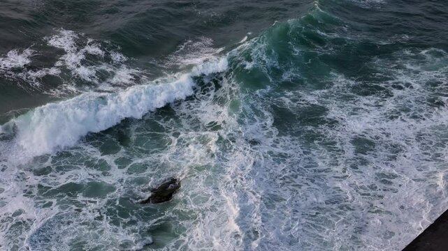 Waves crashing at the coast at Donibane-Lohizune-Saint Jean de Luz, Basque Country.