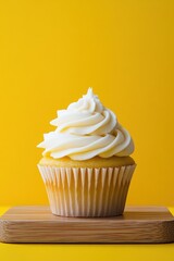 Cupcake on bright yellow background