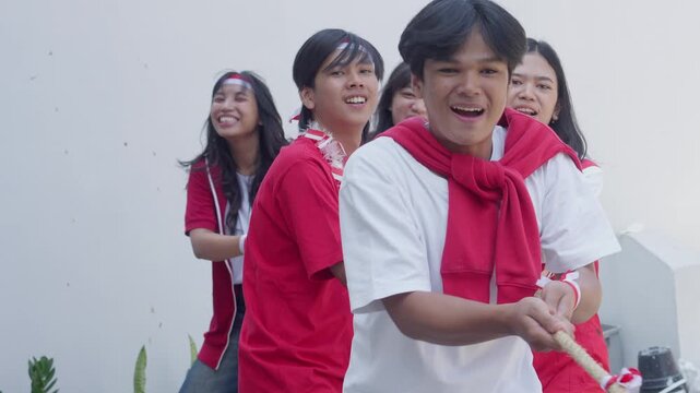 Young Asian People Win The Tug Of War Competition Called Lomba Tarik Tambang On Indonesian Independence Day