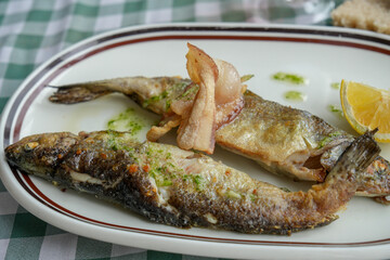Trout with fried serrano ham Spanish recipe
