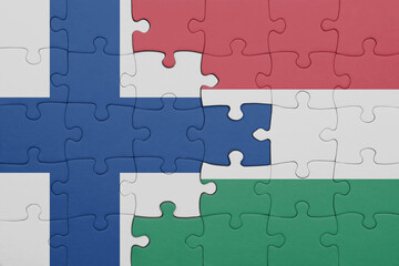 puzzle with the colourful national flag of hungary and flag of finland.