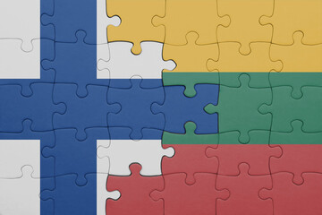 puzzle with the colourful national flag of lithuania and flag of finland.