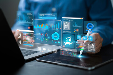 An analyst uses a computer and dashboard for data business analysis and Data Management System, Customers database, gather information to report. Data science technology and digital marketing