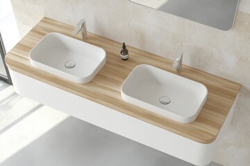 Fototapeta premium View of two sinks, mirrors, and other accessories in the top right corner of a bathroom