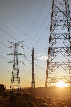 Sunset view of power lines from a Spanish hydro plant