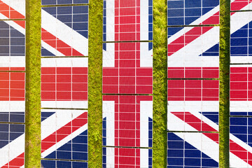 Solar farm superimposed with flag of the UK. Symbolizing solar power and panel demand, renewable energy industry, government policy, and sustainability initiatives in the country.