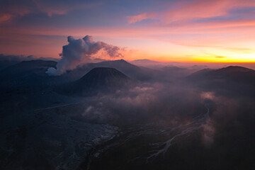 Fototapeta premium the sunset of Bromo, Indonesia with dramatic sky
