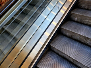 escalator and travelator service and adjustment. lubrication and regular review of the operation of...