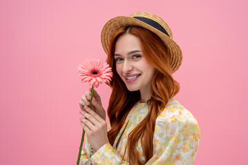 Sweet long-haired young caucasian woman looking happy and relaxed