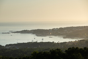 Silhouette of the Galician coast at the opening of the Ria de Pontevedra and the Ria de Arousa at dusk, were the Atlantic ocean meets the land.