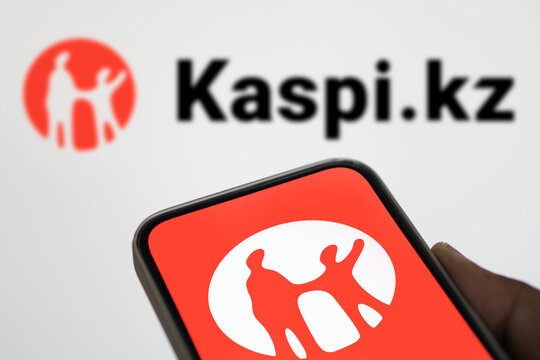 Dhaka, Bangladesh- 08 Aug 2024: Kaspi.kz AO logo is displayed on smartphone.