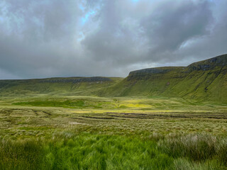 Dramatic Landscape of Benbulbin Under Stormy Skies