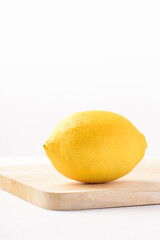 Fresh ripe yellow lemon fruit on white background