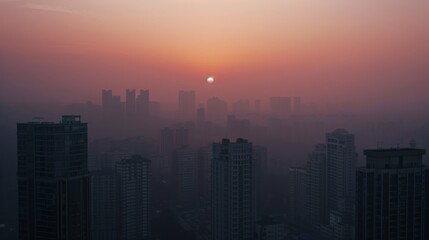 Fototapeta premium A city under the soft glow of the setting sun, shrouded in light haze, creating a dreamy and calming urban landscape.