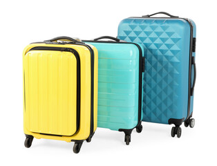 New yellow and light blue suitcases isolated on white