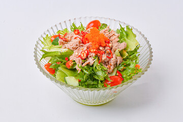 Tuna salad topped with delicious shrimp eggs is ready to eat.