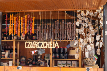 Churchkhela hangs in clusters in the food market close-up. Traditional Georgian national delicacy.