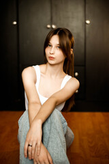 girl posing for the camera with long hair