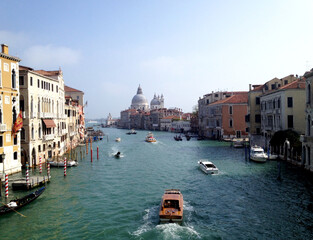 Boats along the Grand Canal on an autumn day in Venice, Italy