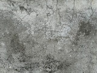 Obraz premium Grunge wall texture background. Paint cracking off dark wall with rust underneath