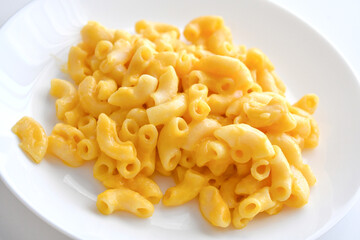 Macaroni and cheese on a plate.