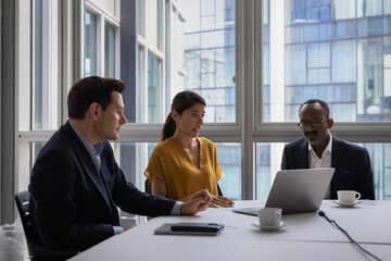 Successful businesswoman giving a presentation in the office board room