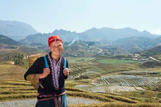 Vietnam, Sapa. Woman from Red Dao tribe with traditional dress