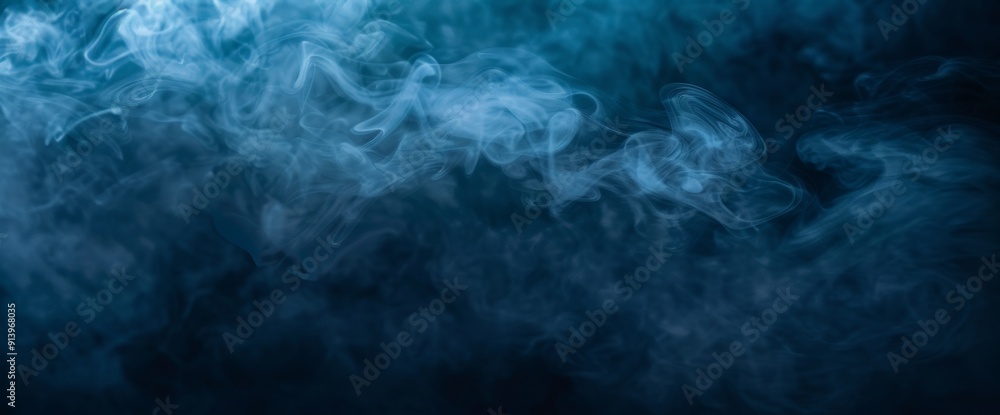 Poster mystical blue smoke swirls gracefully against a dark background, creating an abstract and atmospheri