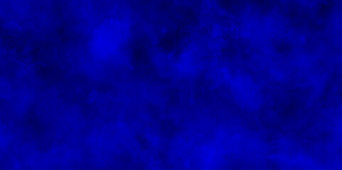 Dark blue background with clouds,Light ink canvas for modern creative grunge design.brush painted blue background used in weeding card,grungy background for decoration,