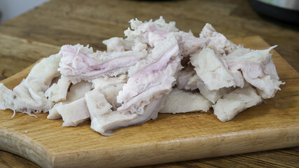Freshly cut pieces of beef tripe ready for cooking in kitchen
