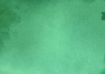 Rough surface with villi spots and particles on a green background