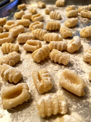 A sheet tray of fresh, homemade potato gnocchi pasta