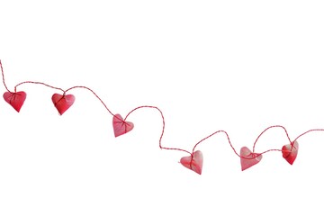 Clothespins with hearts. Hearts on ropes. Red hearts on a white background