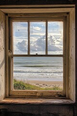 A window in a small coastal cottage, overlooking a serene beach with gentle waves.
