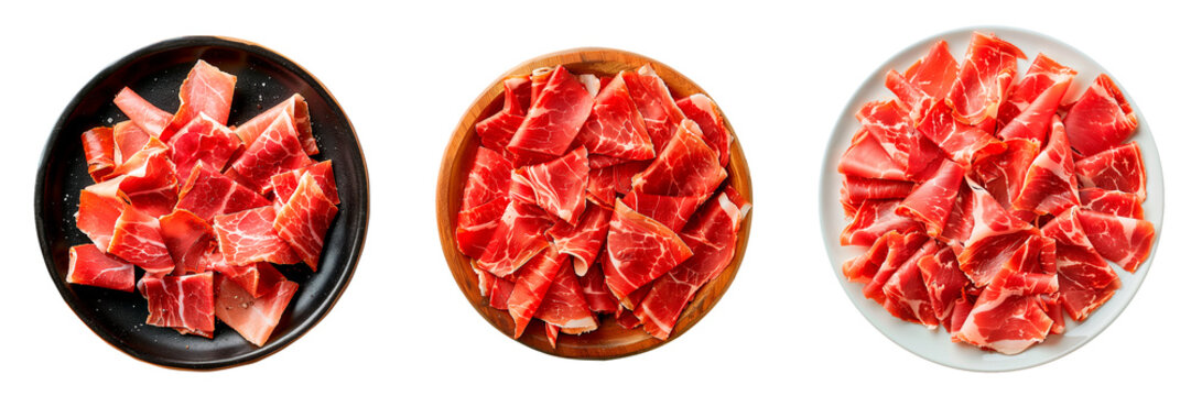 Set of a iberian ham in a plate isolated on a white or transparent background. Iberian ham in a wooden, black and white plate. Traditional Spanish dish. Top view