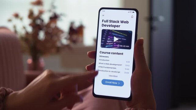 Learning to code online. Checking full stack web development online course using app for mobile phone. Fictional Interface.