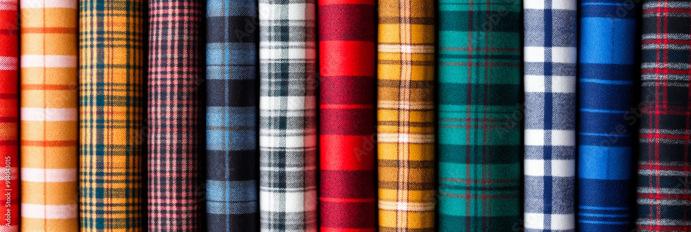 Poster assorted colorful tartan fabrics in varying checked patterns, a perfect representation of scottish h