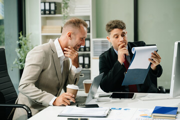 Portrait of success business people working together in modern office.