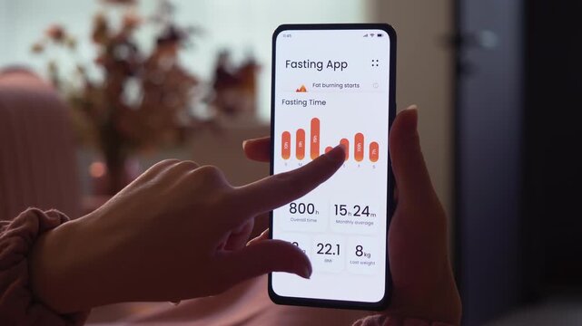Tracking intermittent fasting time using a special smartphone app. Following a time-restricted diet with the help of a mobile application. Fictional Interface.