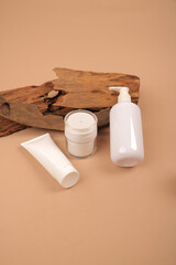 Minimalist Skincare Cream and Tube Packaging Mockup with Natural Wood Element