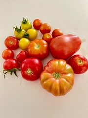 Different red, orange and yellow tomatoes 