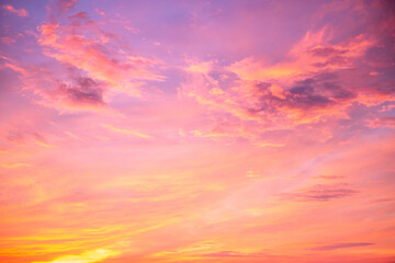 Obraz premium Beautiful , luxury soft gradient orange gold clouds and sunlight on the blue sky perfect for the background, take in everning,Twilight, Large size, high definition landscape photo