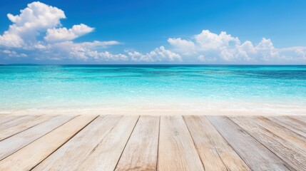 Fototapeta premium A serene tropical beach features a wooden deck facing tranquil waters beneath a bright blue sky