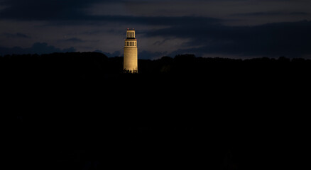 Illuminated Buchenwald Memorial Tower, on Freedom Square near Weimar, Germany. Monument...