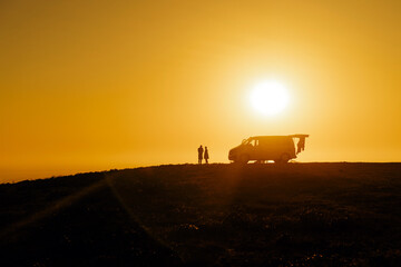Van Camping Adventure at Sunset with Family
