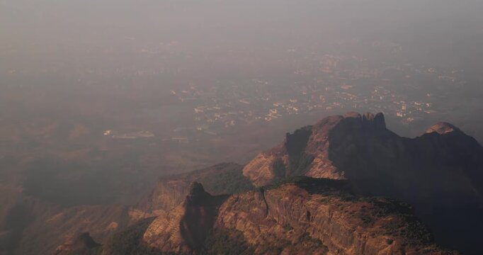 Mumbai, India. Badlapur, Savaroli, Maharashtra. Aerial View From plane Window On View of the Mumbai suburb district. Evening morning sunset sunrise light. residential district skyline cityscape